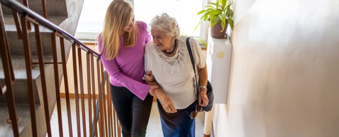 Caregiver,Helping,Senior,Woman,Climb,Staircase